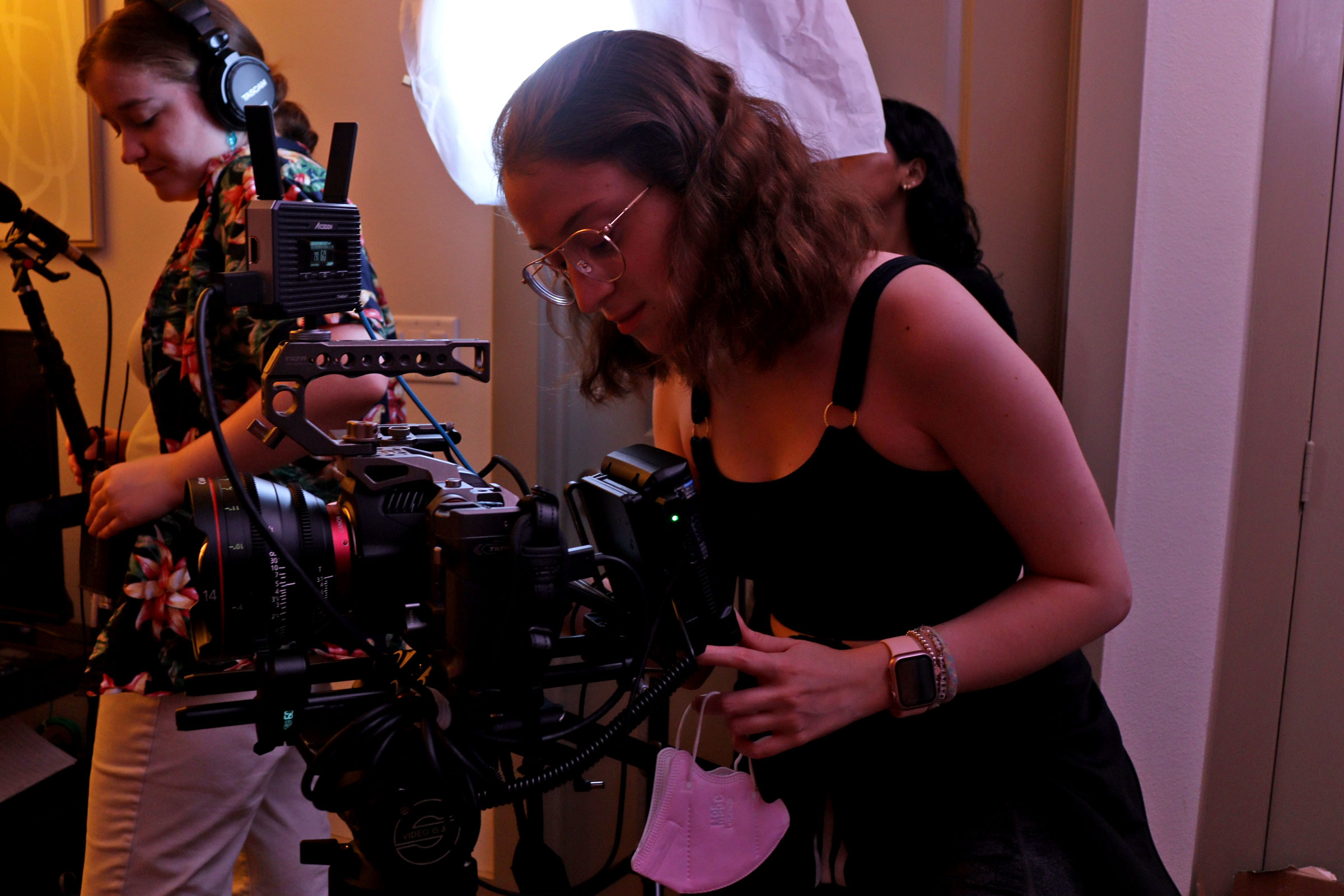 A crew member operates a camera on set of the new film, "Crossroads."
