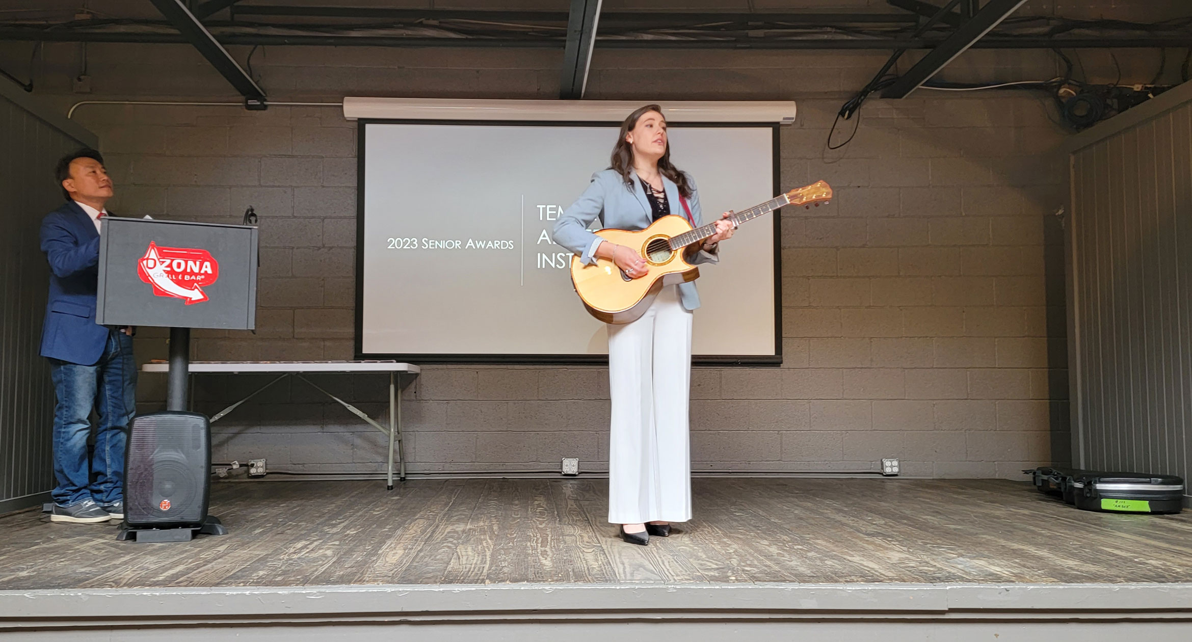 Advertising student Amber Bormann plays original music during the Temerlin Awards Ceremony.