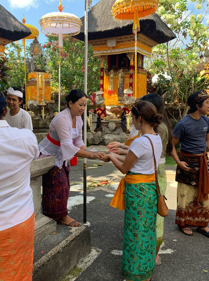 Students learn Balinese offering rituals during their program.