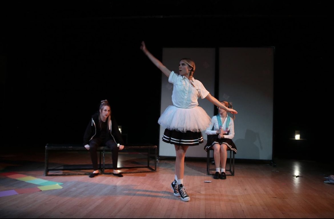 Actors perform a choreographed component in a student-led production with SMU Student Theatre.