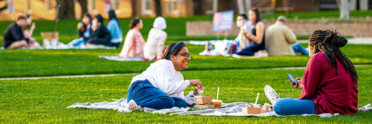 Student enjoying the afternoon on the quad.