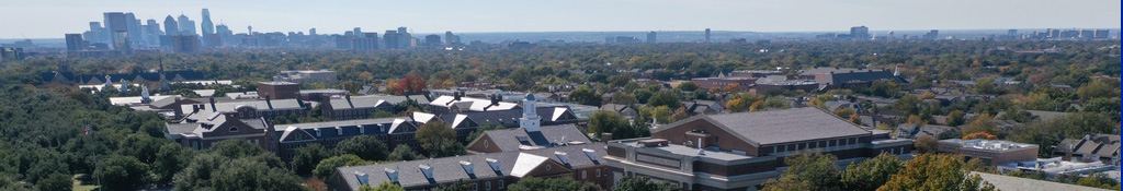 campus view from above with Dallas skyline in the background