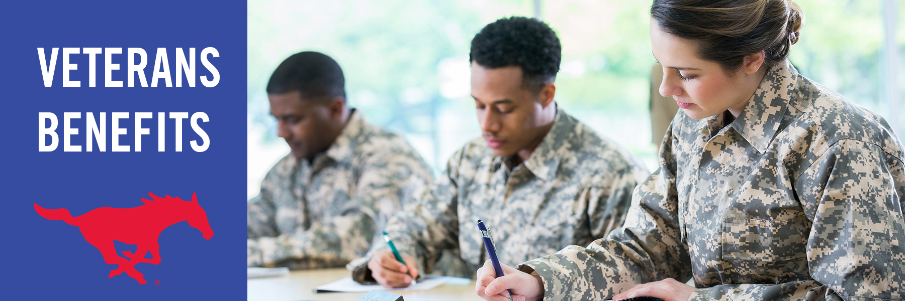 Veterans Benefits - Three students in military uniform take an exam