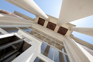 Entrance of Fondren Library. Looking up at columns. 