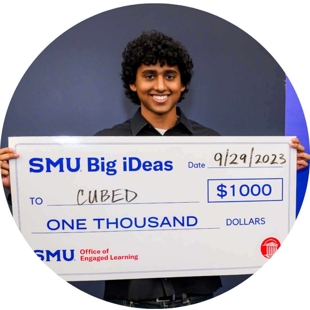Rahit Patnala, founder of Cubed, with big check from Big iDeas