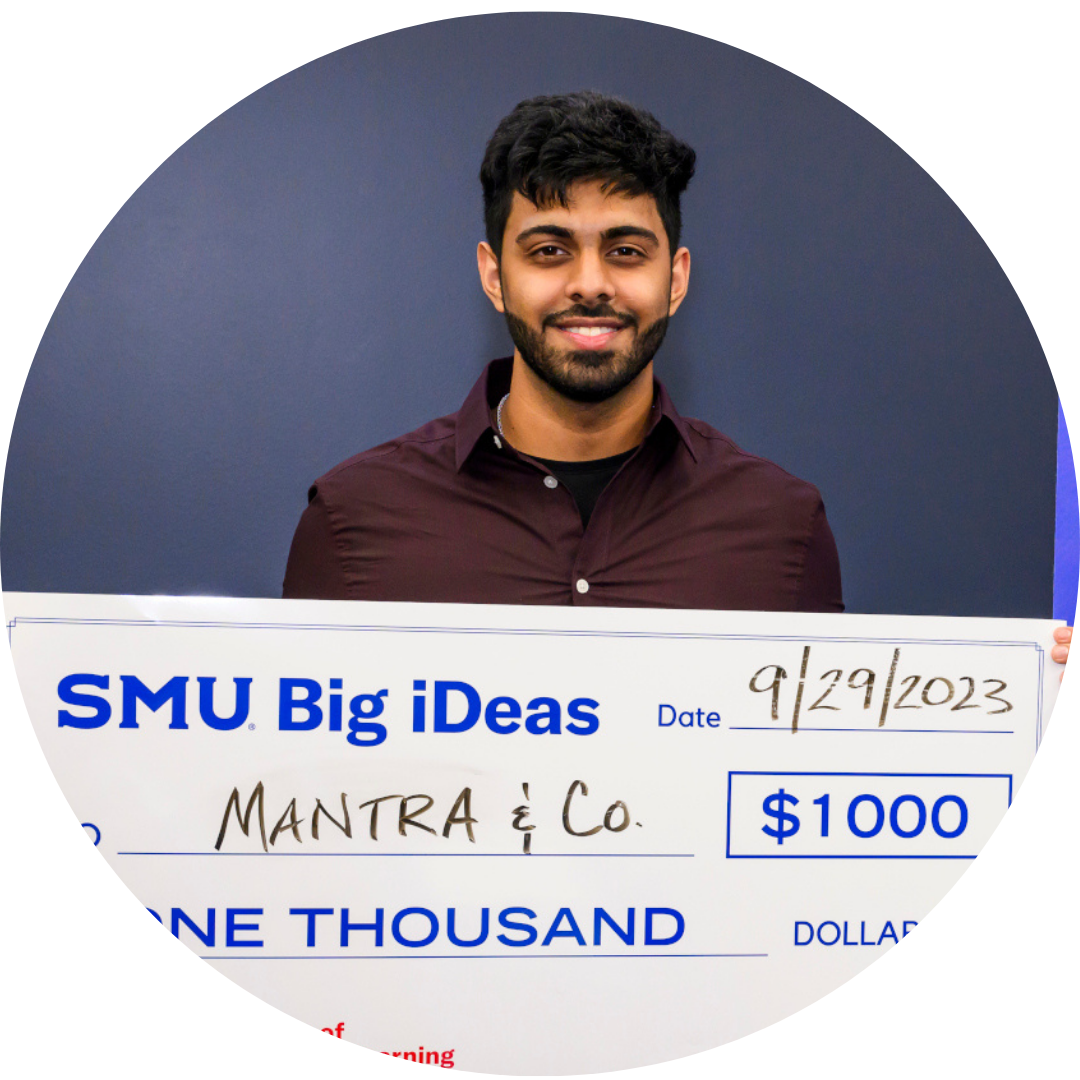 Zain Dhatwani of Mantra and Co., with big check from Big iDeas