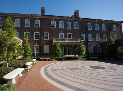 Picture of Selecman Hall building and meditation garden