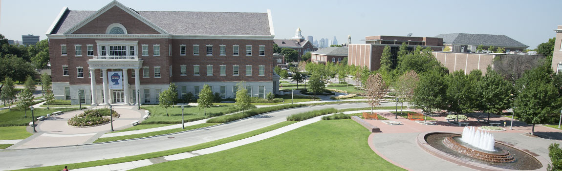 Annette Caldwell Simmons Hall - North entrance with Dallas Skyline in background