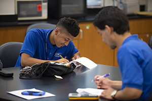 two students working