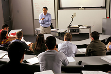 Professor in class speaking to students
