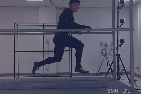 Athlete running on the Simmons Locomotor Performance Laboratory's force measurement treadmill