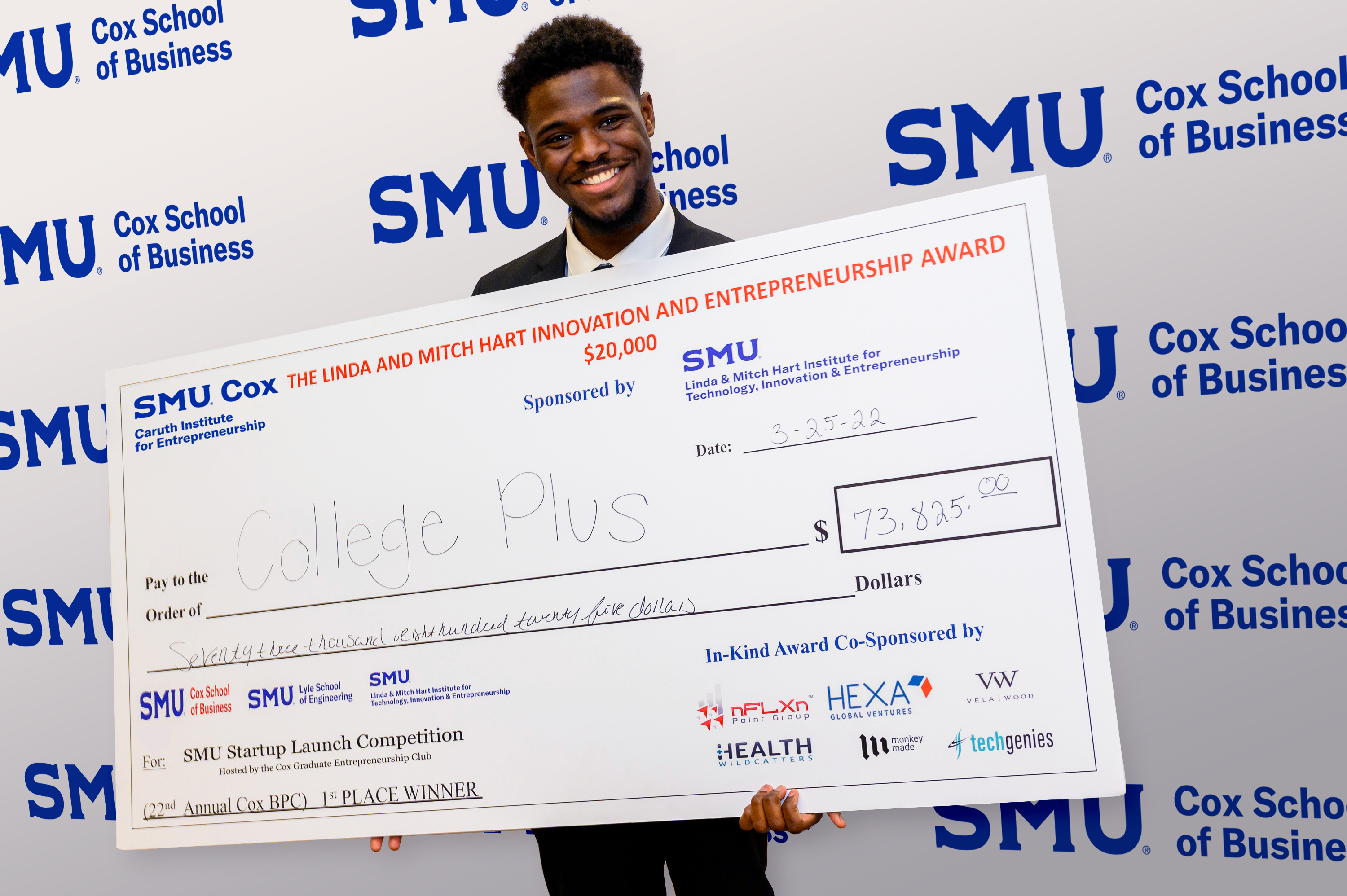 Seun Suberu ’23 holding a large check for first prize ($73,825)