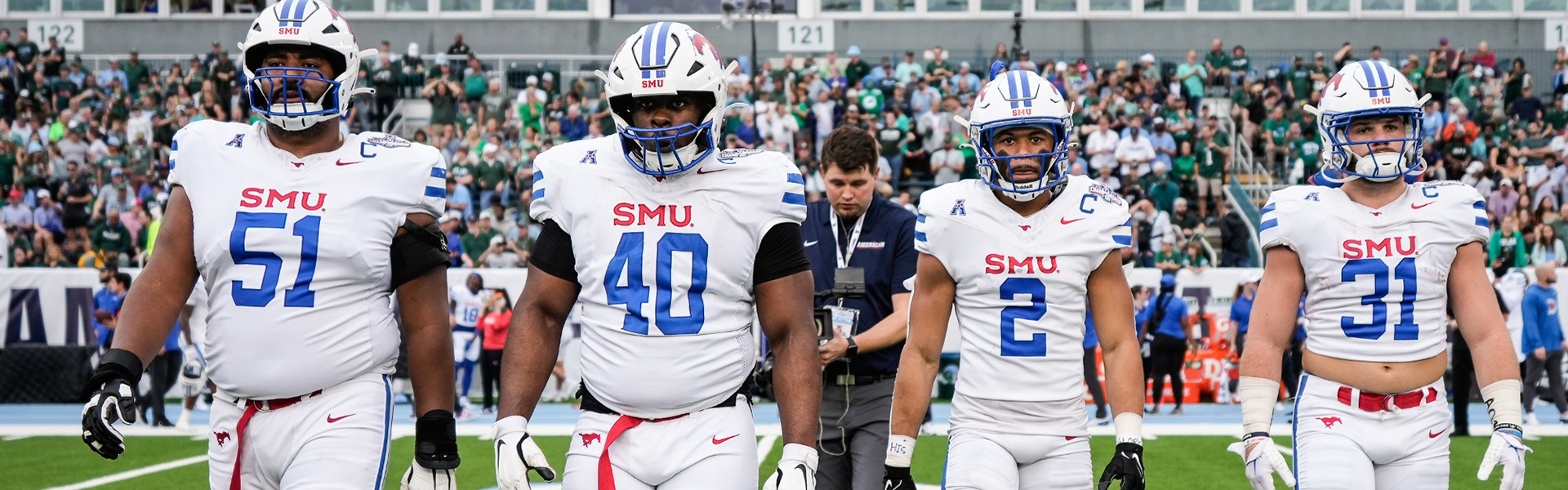 SMU Football players going out for the coin toss