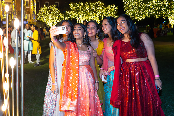 Students posing for a selfie at the Diwali celebration