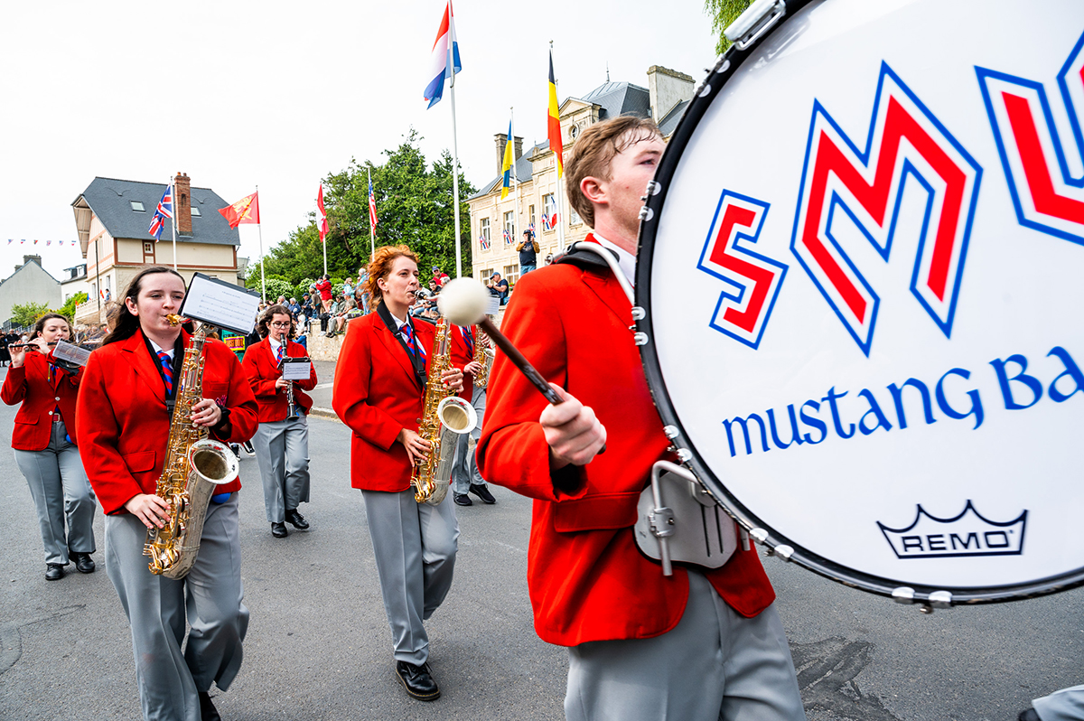 SMU bandmates performing in Normandy, France, as they represented the United States during a D-Day commemorative event.