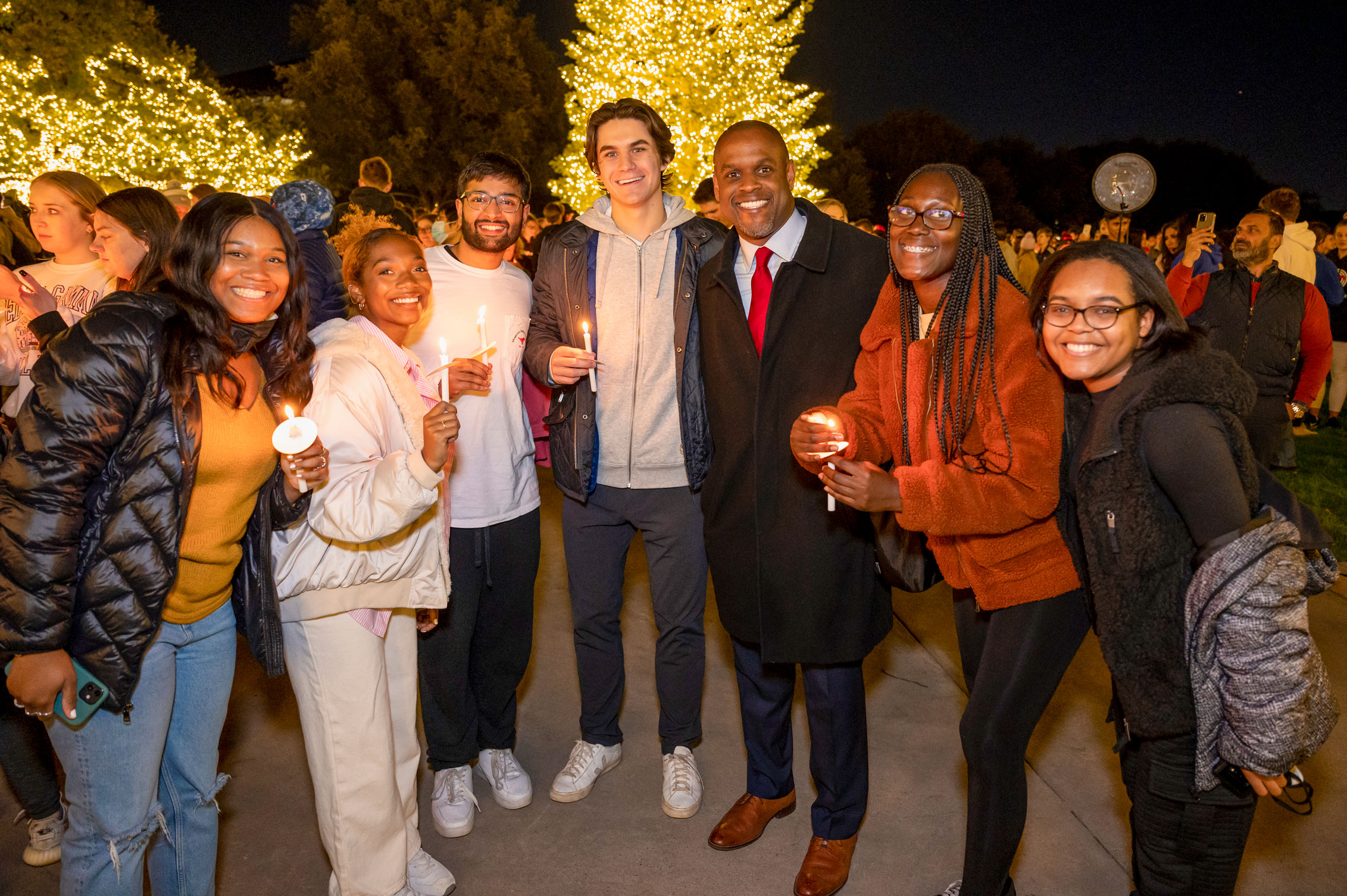Dr. Mmeje and students at Celebration of Lights