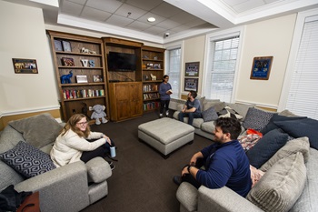 Student in the Virginia-Snider lounge