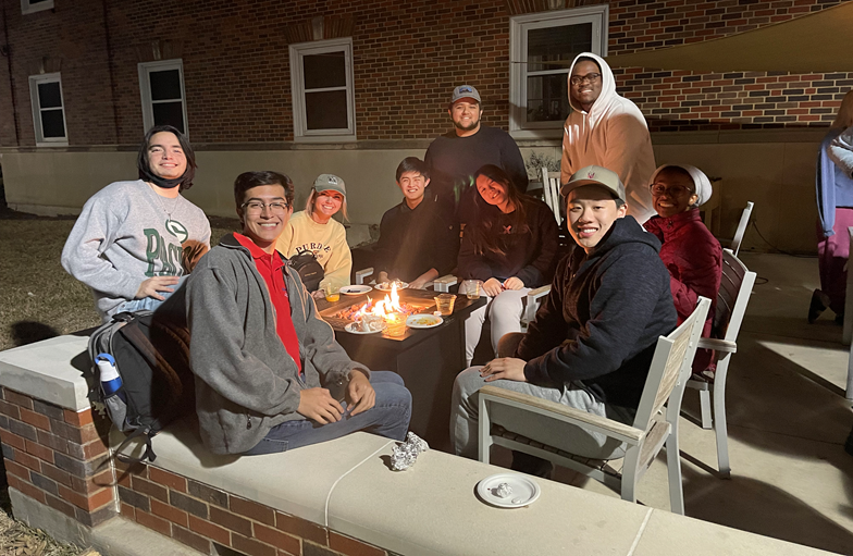Students relaxing on the Boaz Commons Patio