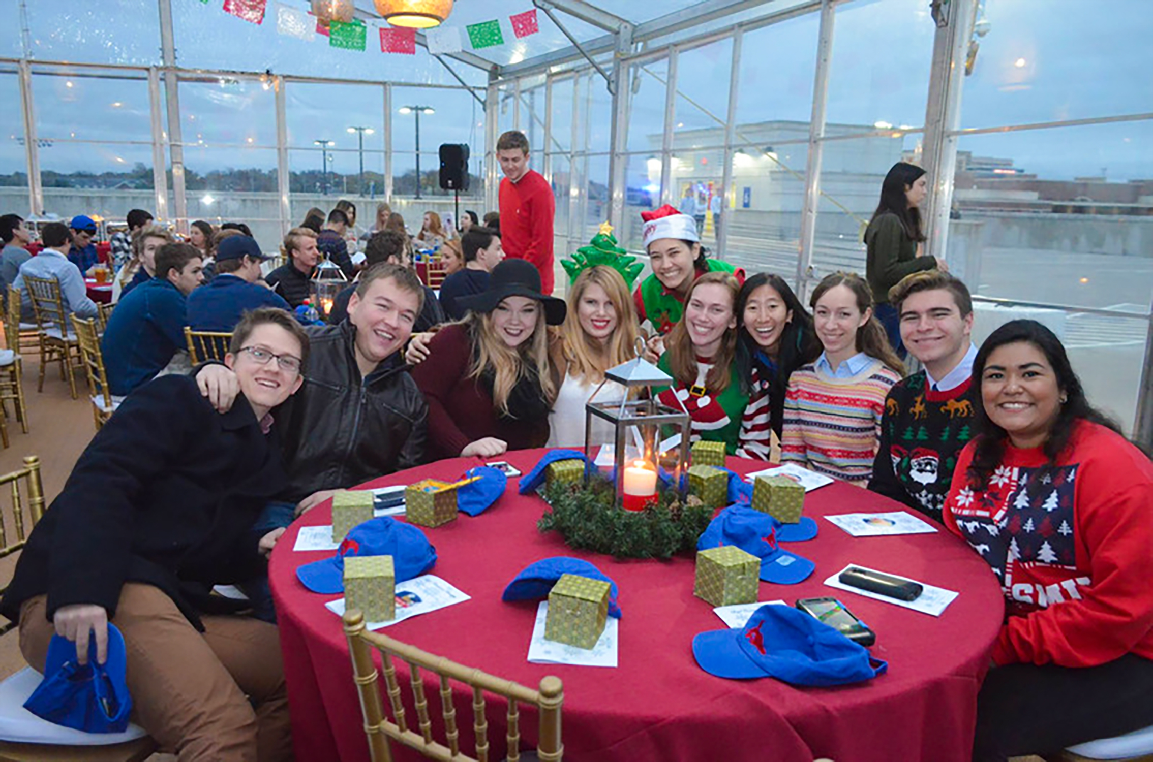 Students enjoying a roof top banquet