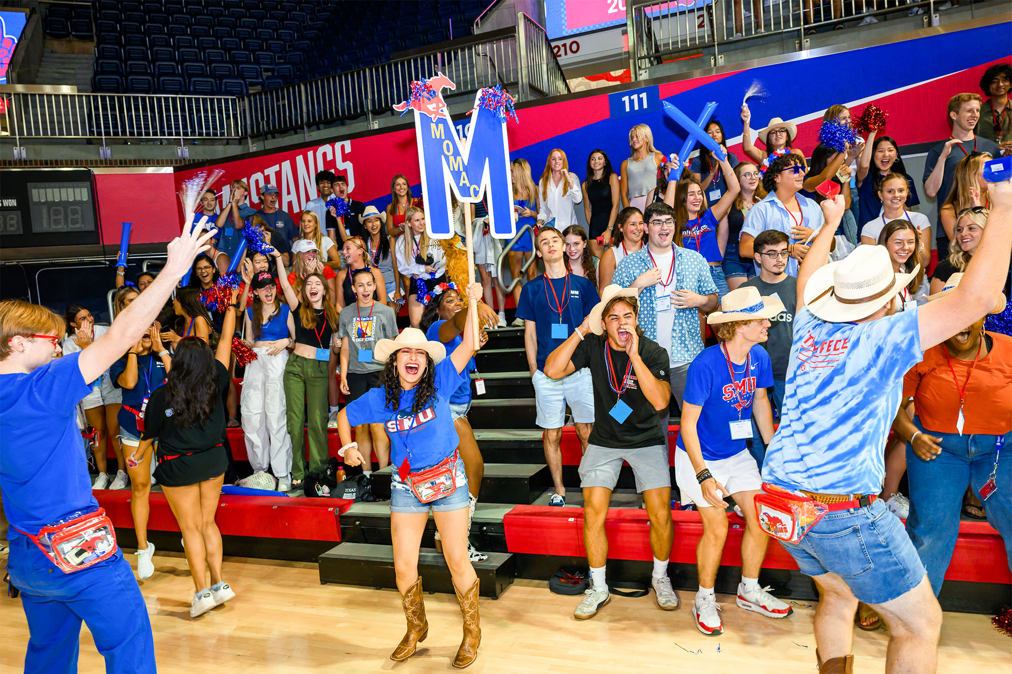 students yelling for fun during stampede kickoff in moody coliseum