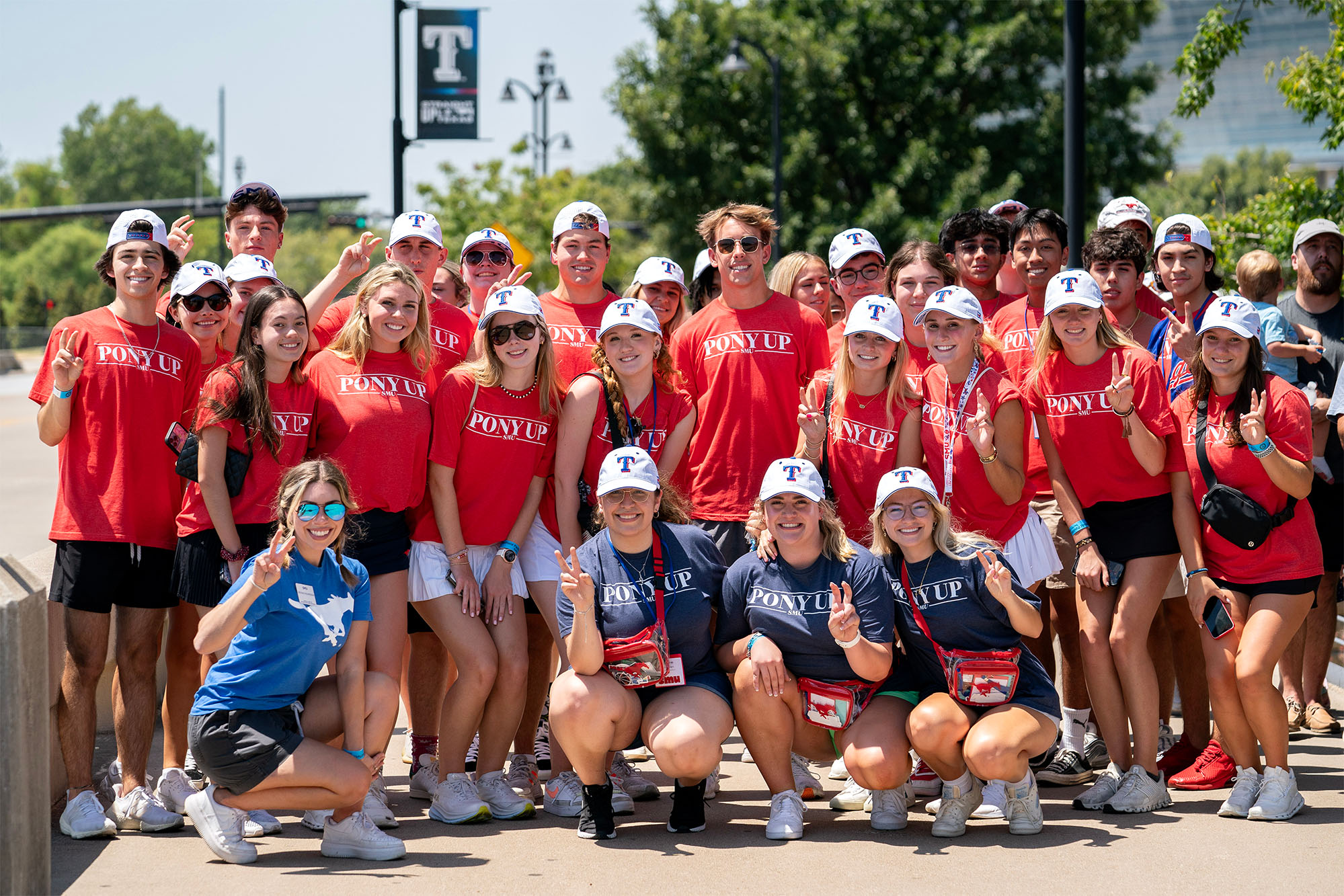 students outside of Texas Rangers stadium for a baseball game during Stampede 2023