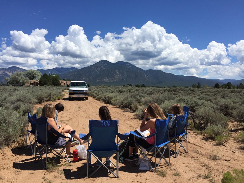 Group of SMU students spending time together in rural Taos, New Mexico