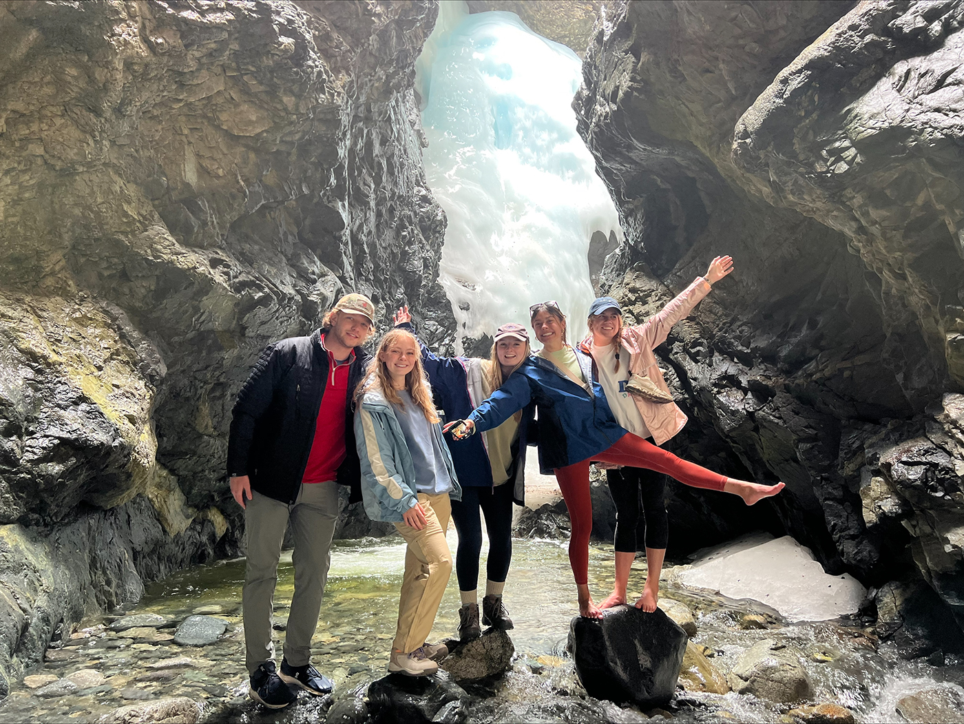SMU-in-Taos students gather at the base of a frozen waterfall in Taos, NM.