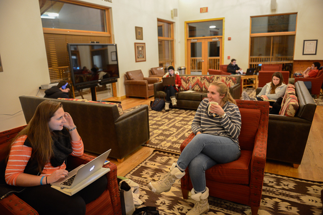 Students talk and work in the SMU-in-Taos Library