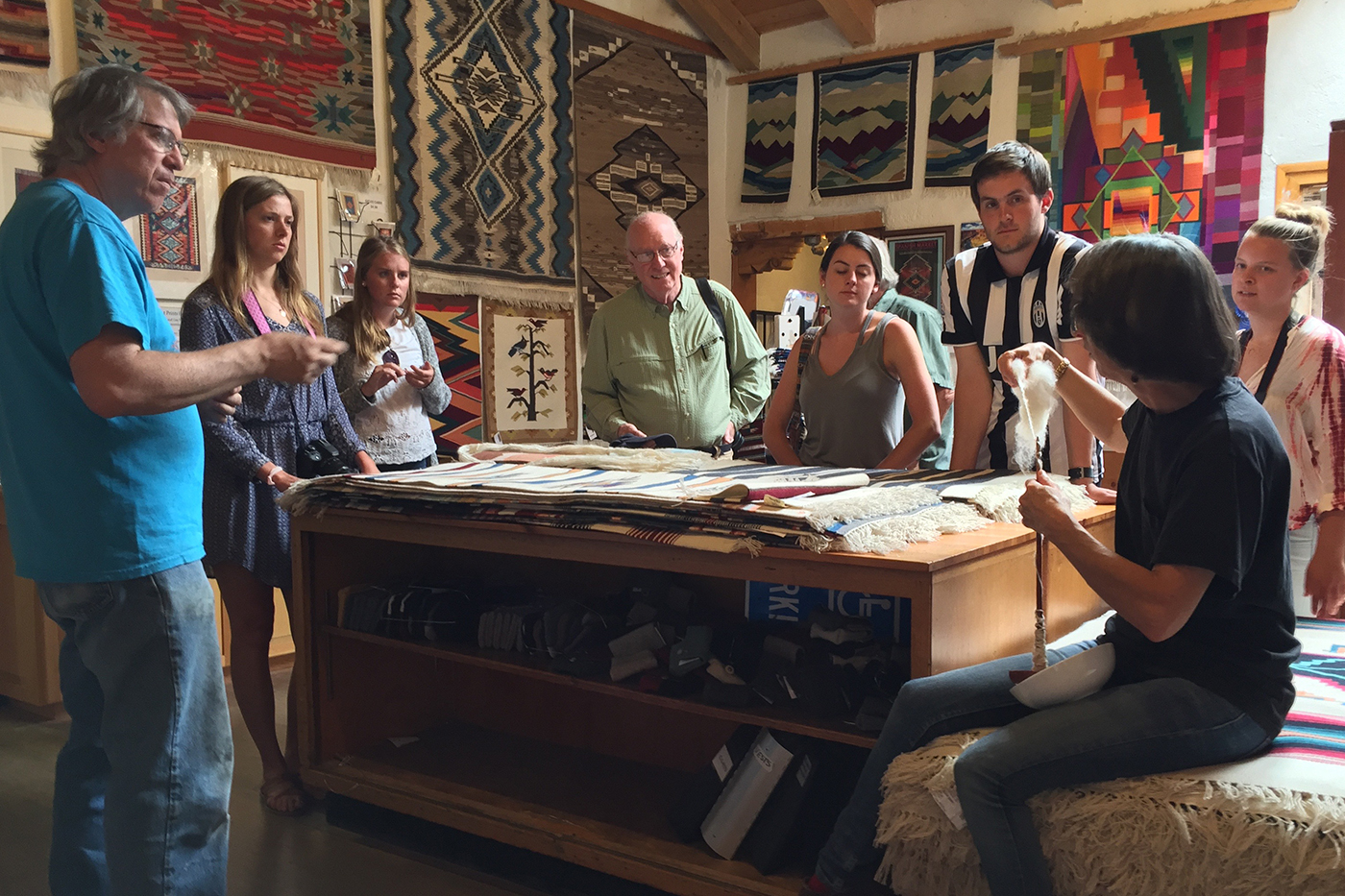 SMU-in-Taos class gathers in a studio
