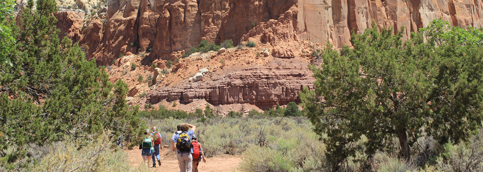 SMU-in-Taos students prepare to hike a dry mountain
