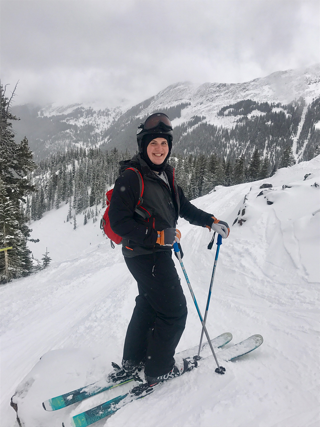 SMU-in-Taos student Carson Yeager prepares to ski down the snow-covered mountain in Taos, New Mexico.