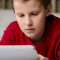 boy reading ebook