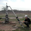 Michael Paul, SMU director of energy management and engineering, collects temperatures at a field near Corpus Christi.