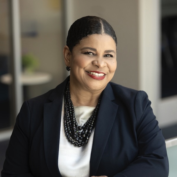 A portrait photo of Kathy Hubbard smiling