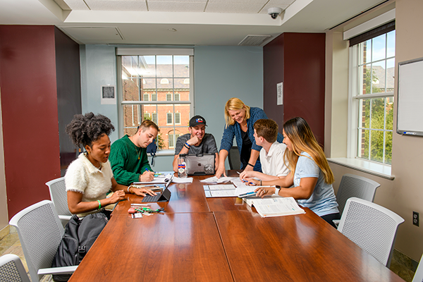 SMU transfer students meeting with advisors to evaluate and discuss academic credit transfers.