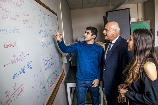 Nikos Makris teaches graduate students