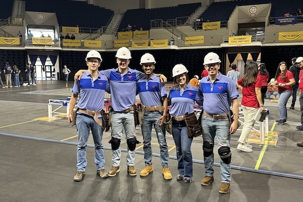 5 civil engineering students in hard hats