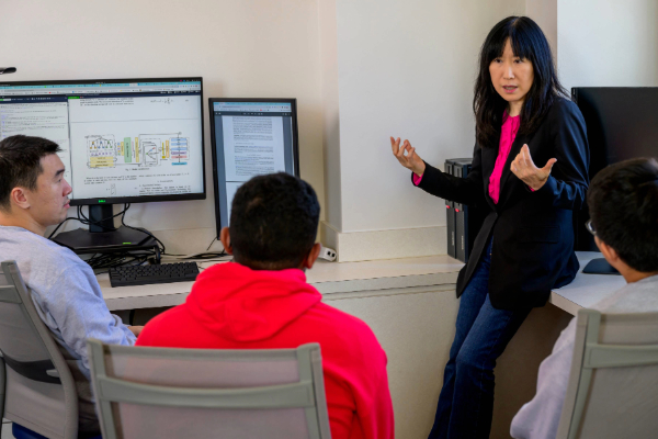 Jia Zhang, Ph.D. teaches students during a computer science class at SMU Lyle