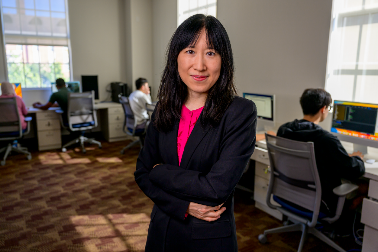 Professor Jia Zhang stands with arms crossed