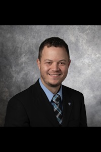 A headshot of Eric Larson, a member of the Lyle School of Engineering Faculty.