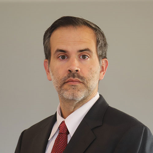 A portrait headshot of Phillip Blackstone