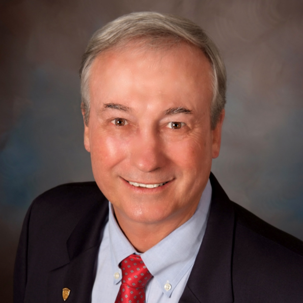 A portrait headshot of Dan Wittliff