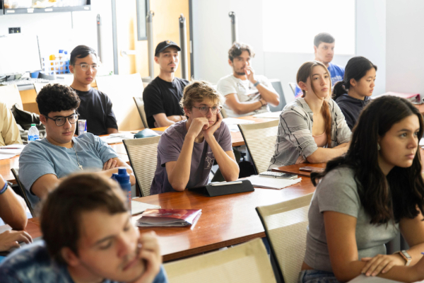 A group of students looking engaged during a class at SMU Lyle School of Engineering