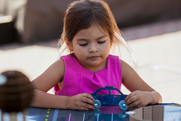 little girl in pink shirt