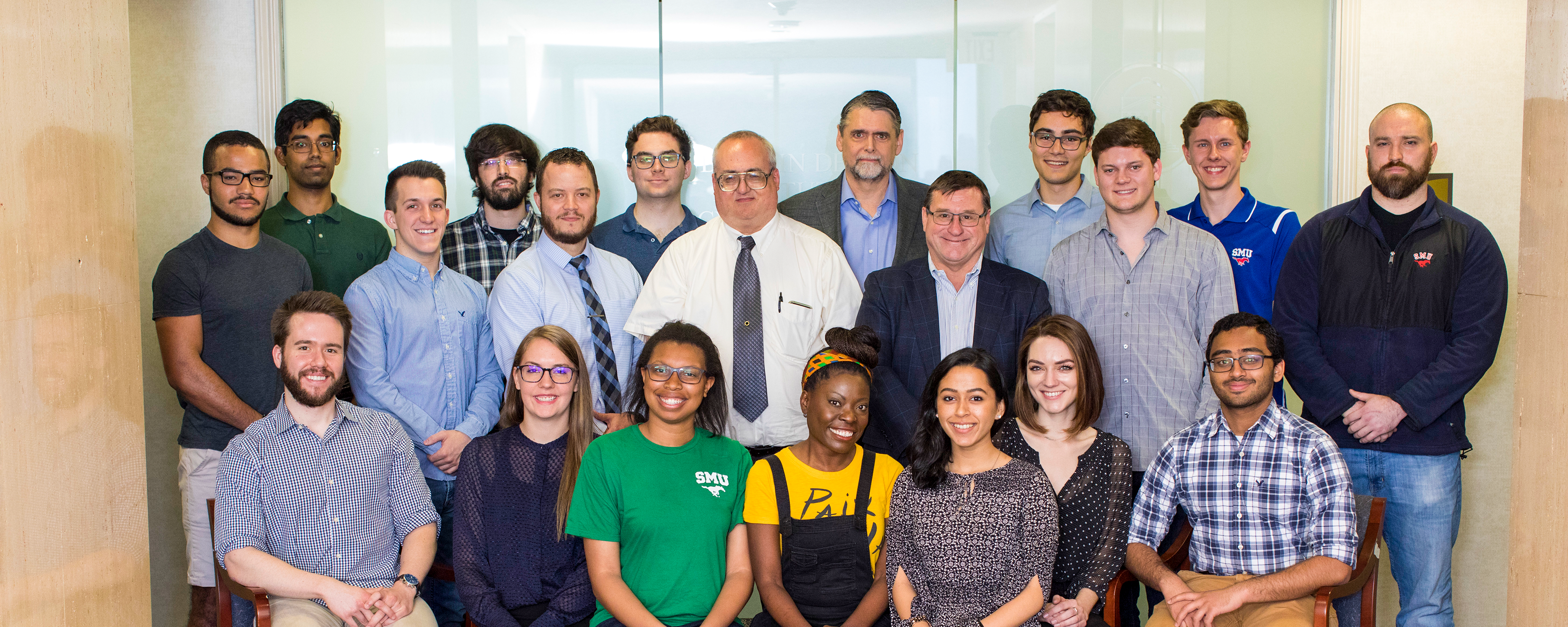 group of people posing for photo