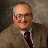A headshot of Theodore Manikas, a member of the Lyle School of Engineering Faculty.