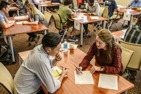 A student is having their resume reviewed by a career professional at Engineering Resumania at SMU Lyle