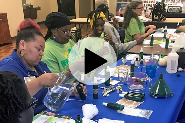 Pharr Andrews and team conducting a hands-on science activity at a table for Energy Equip.