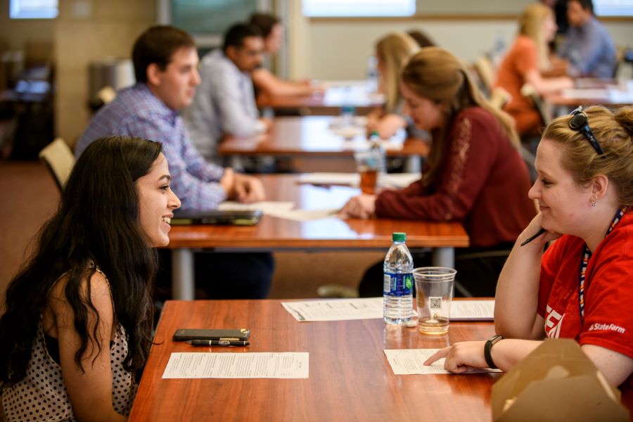 Students share resumes at the Hart Center Resumania event