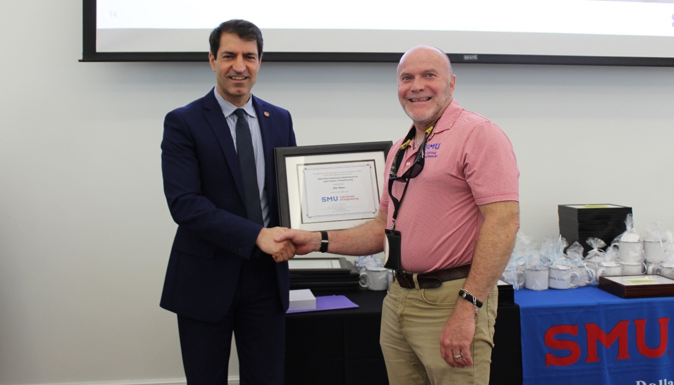 Picture of Jim Dees and Engineering Dean, Nader Jalili shaking hands for his 35th Anniversary